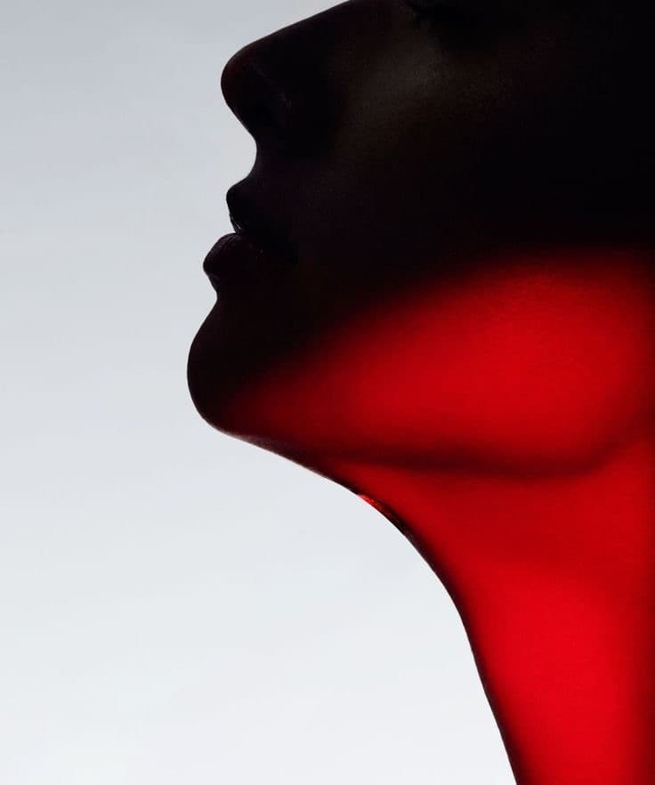 Quiet profile and neck, lit in infrared red