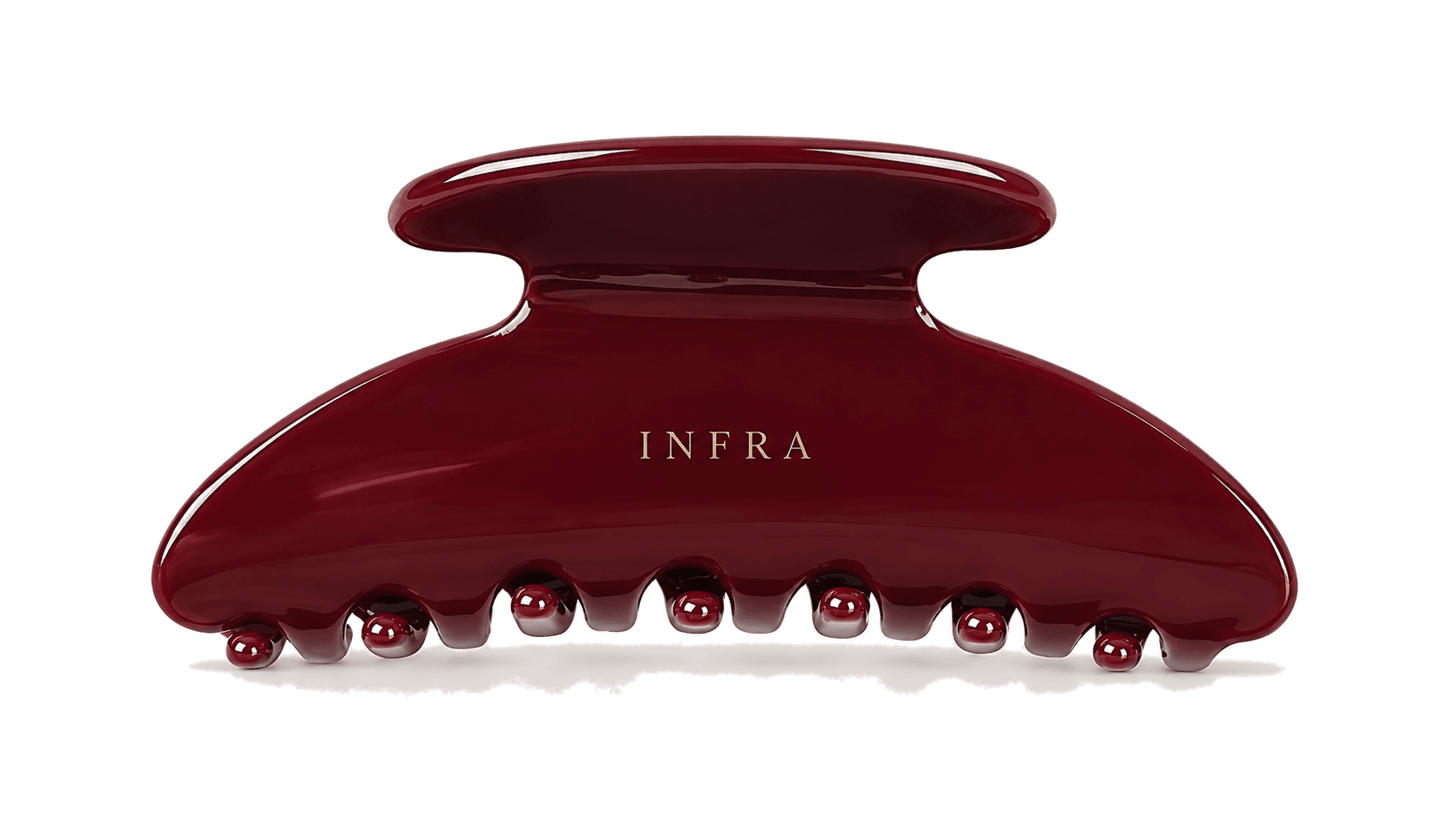 The INFRA hair claw, finished in lacquered burgundy
